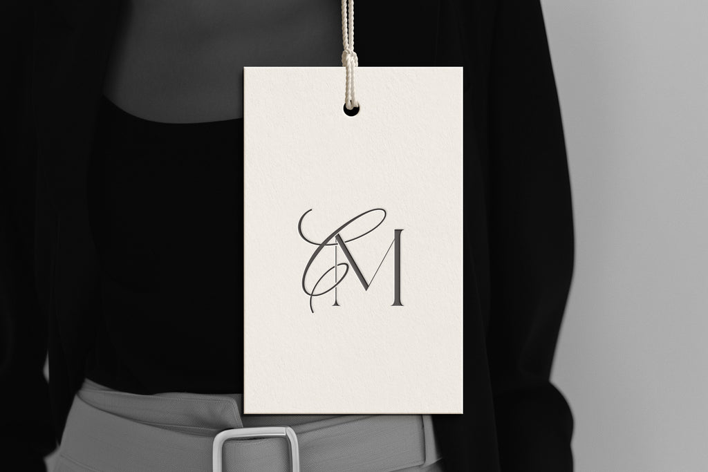CM Reverie monogram on debossed hang tag