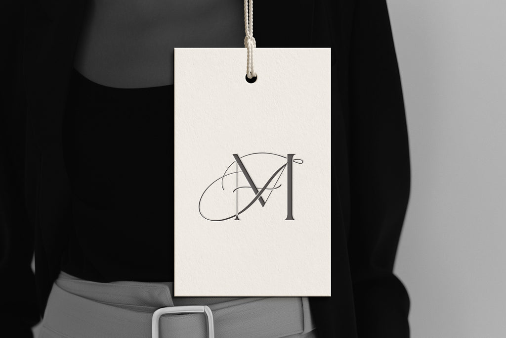 FM Reverie monogram on debossed hang tag
