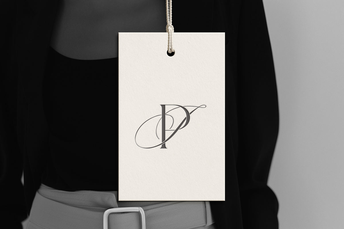 JP Reverie monogram on debossed hang tag