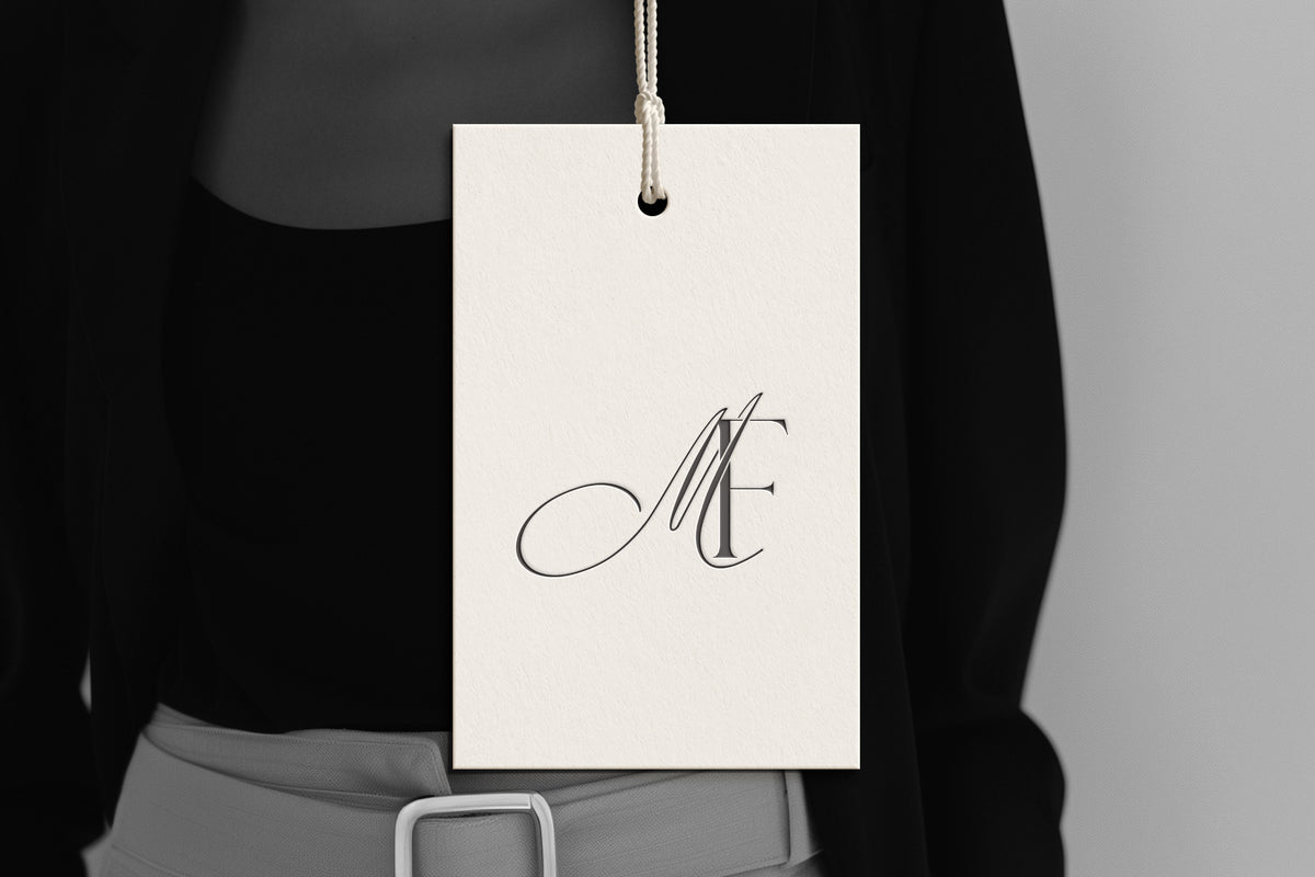 MF Reverie monogram on debossed hang tag