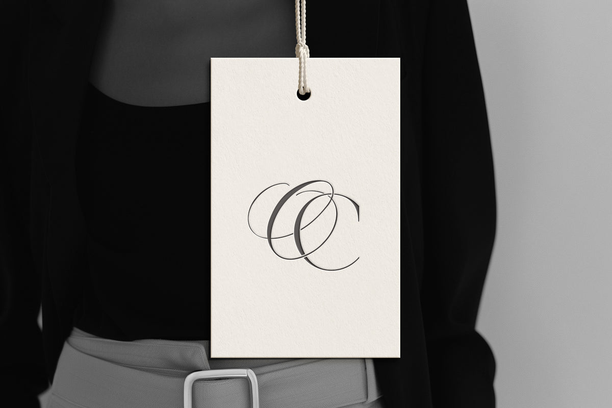 OC Reverie monogram on debossed hang tag