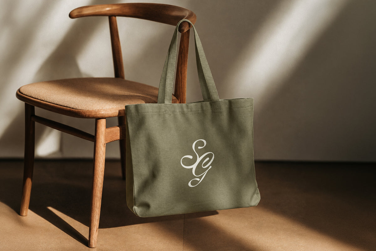 SG Amalfi monogram on olive canvas tote bag branding mockup
