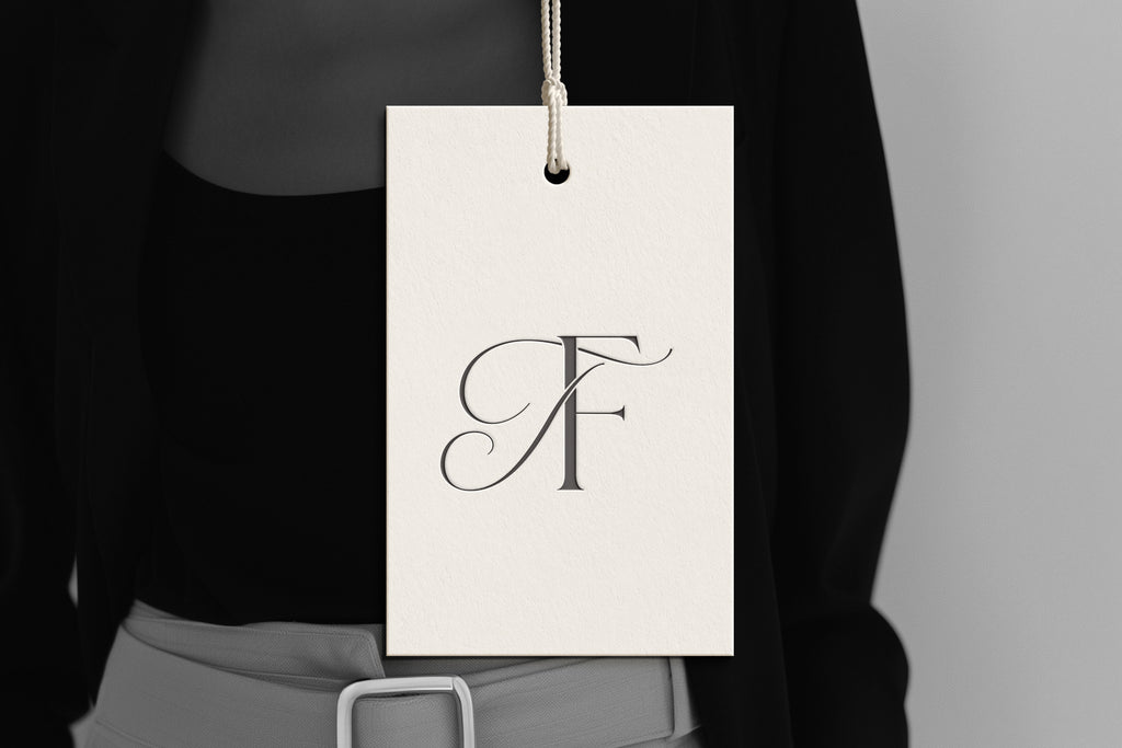 TF Reverie monogram on debossed hang tag