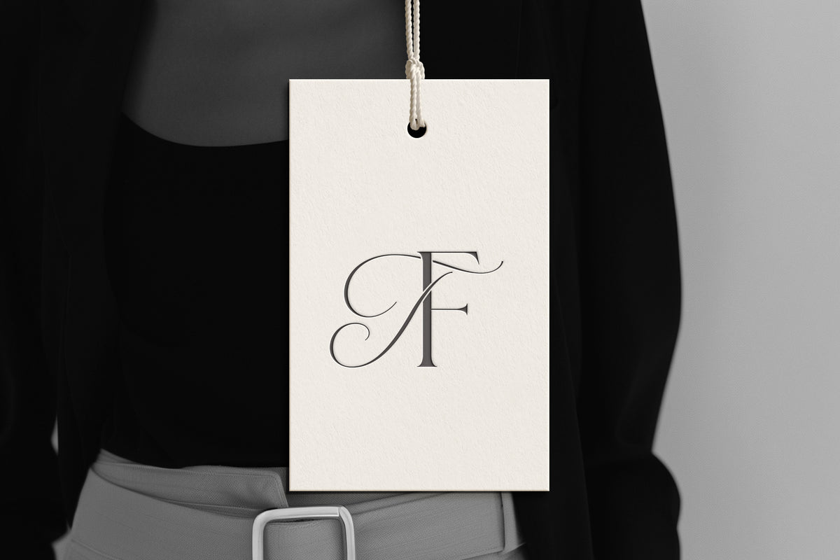 TF Reverie monogram on debossed hang tag