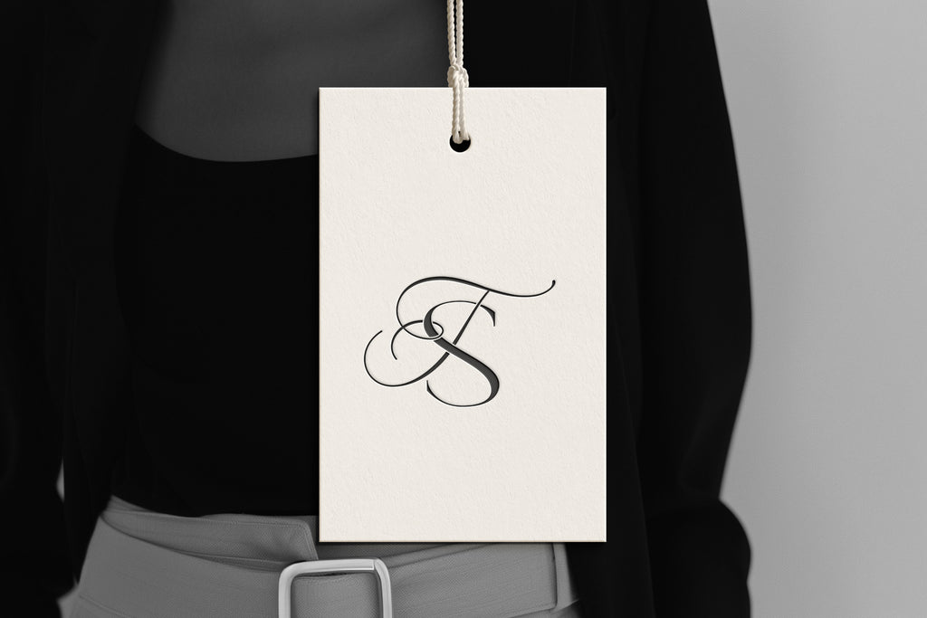 TS Reverie monogram on debossed hang tag